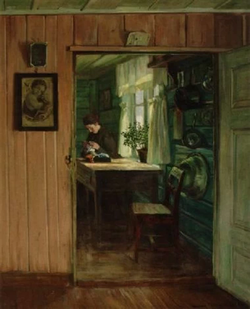 Donna che cuce in interno